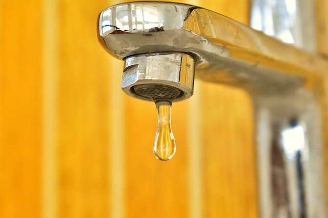 sink leaking water drop