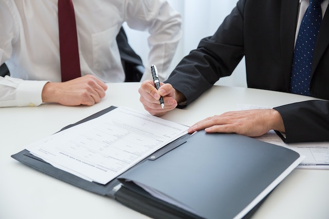 two people going over a rental agreement