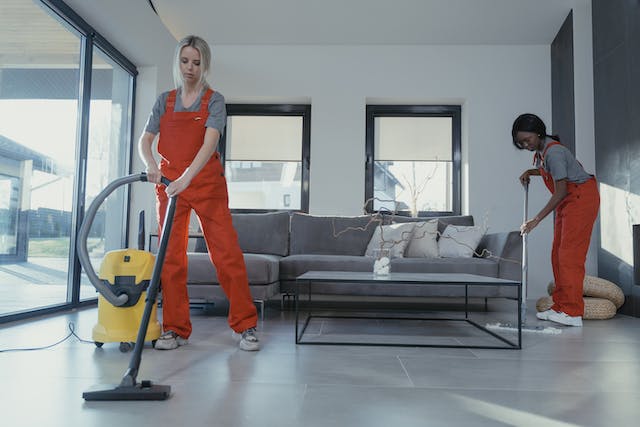 two-people-cleaning-the-property