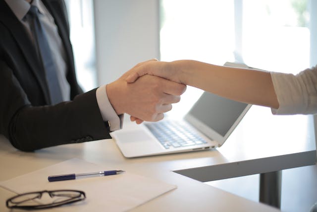 landlord-shaking-hands-with-tenant